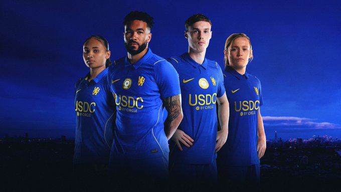 Four Chelsea FC players model the team's new blue away kit featuring the "USDC by Circle" sponsor logo prominently across the chest. The Web3-themed post appreciates the kit's appeal to crypto-savvy fans, given USDC's prominent branding on the traditional football jersey.