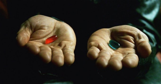 Two open palms are held out against a dark background, one cradling a red pill and the other a blue pill—a direct reference to the iconic choice from *The Matrix*. The image cleverly frames the "red pill/blue pill" decision as a metaphor for either giving up on NFTs or diving deeper into the world of minting.