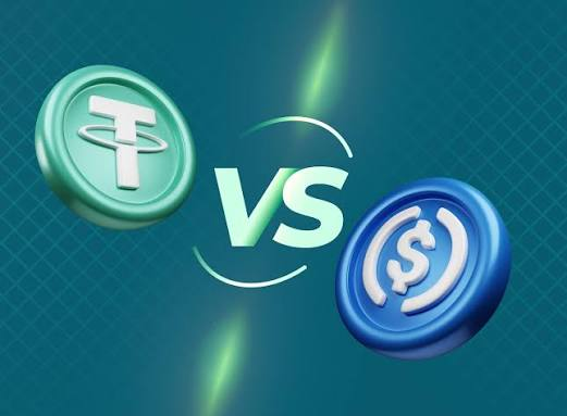 Two stylized cryptocurrency coins face off against a teal background, with a green Tether (USDT) coin on the left and a blue USDC coin on the right, separated by a glowing "VS" graphic. The image visually represents the comparison between the two leading stablecoins, aligning with the post's discussion of TRON's massive $2.1 trillion in USDT transfer volume during Q2 2026.