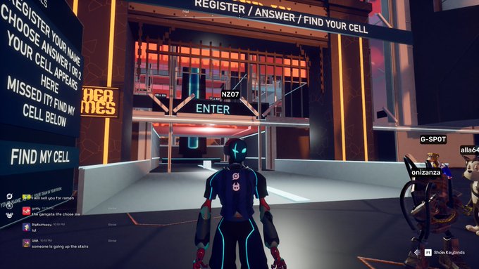 A screenshot from a virtual reality game shows a character in futuristic gear standing at a 'REGISTER / ANSWER / FIND YOUR CELL' entrance, with chat visible on the left side.