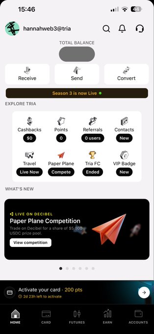 A screenshot of a mobile crypto wallet app called "Tria" for user hannahweb3, showing a total balance of $0, various navigation icons, and a "Paper Plane Competition" advertisement.