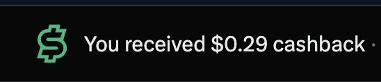 A cashback notification showing "You received $0.29 cashback" in green, illustrating the small incremental rewards that can accumulate over time, fitting the context of deciding between all-in investing versus dollar-cost averaging (DCA) strategies.
