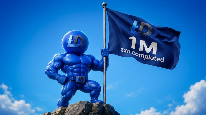 The image features a blue statue of a muscular man holding a blue flag with the words "1M completed" written on it. The flag is attached to a pole that stands on top of a rock, creating an impressive visual effect. In the background, there are clouds visible against a clear sky, adding depth and context to the scene.