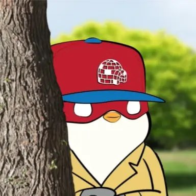 An animated illustration of a penguin-like character wearing a red cap with an igloo logo, sunglasses, and a tan trench coat, peeking out from behind a tree trunk.