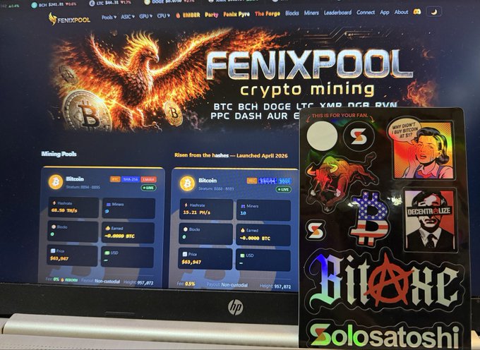 A computer monitor displays the FENIXPOOL crypto mining website showing Bitcoin and Litecoin mining pool statistics with a hash rate of 68.30 TH/s and 15.21 MH/s respectively, while a "Satoshi Sticker Pack" featuring "Buy Bitcoin" and "Bitcoin" themed designs sits in the foreground—perfectly illustrating the post's call to support home mining with cool stickers.