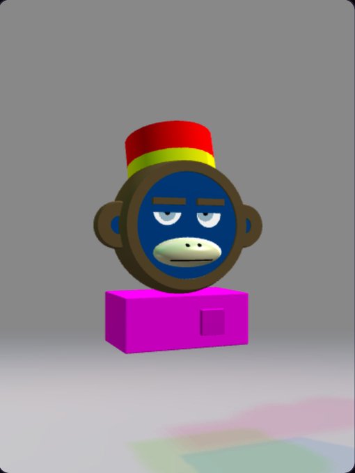 A 3D-rendered cartoon monkey character with blue fur, wearing a red and yellow fez hat, stands on a purple rectangular block against a gray background.