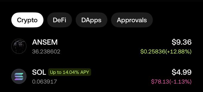 A dark-themed cryptocurrency portfolio interface showing tabs for Crypto, DeFi, DApps, and Approvals, with holdings for ANSEM token at $9.36 (+12.88%) and SOL at $4.99 (-1.13%) with up to 14.04% APY.