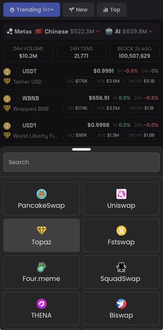 The image shows a phone screen displaying various social media icons, including "Four meme", "Uniswap", and "Topaz". The text of the post reads "Gm @BNBCHAIN We just hit our first 10M+ in daily volume. We're working on big updates and this is only the beginning." This suggests that there might be a social media platform or app being discussed, possibly related to cryptocurrency trading or financial news.