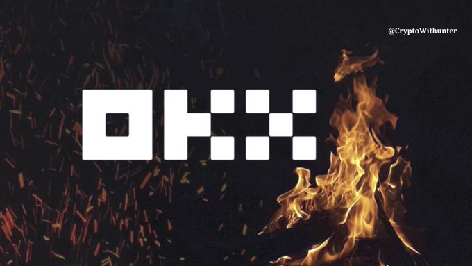 The OKX cryptocurrency exchange logo in white squares against a dark background with flames, credited to "@CryptoWithunter".