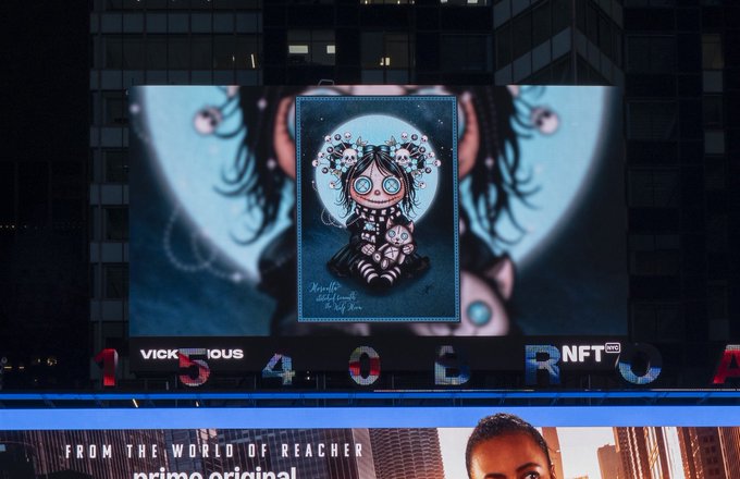 A Times Square billboard advertisement for the '1540 NFT' featuring gothic-style digital artwork by Vicious, displayed above a Prime Original 'Reacher' promo.