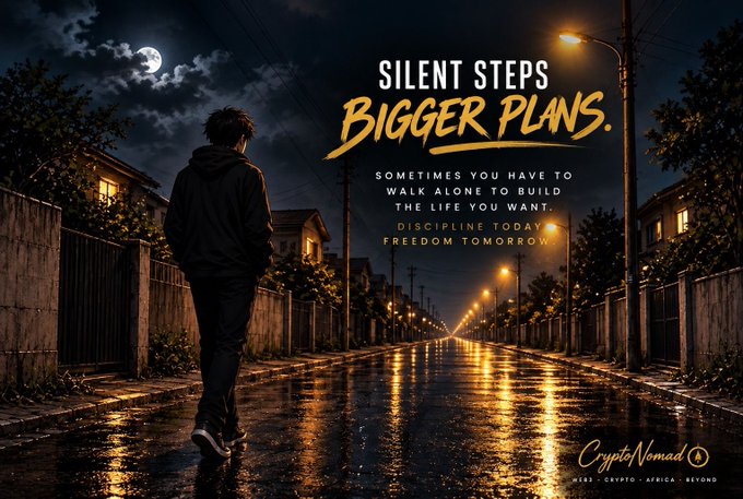 A motivational poster showing a silhouetted figure walking down a wet street at night with text reading 'SILENT STEPS BIGGER PLANS. SOMETIMES YOU HAVE TO WALK ALONE TO BUILD THE LIFE YOU WANT. DISCIPLINE TODAY FREEDOM TOMORROW' by 'CryptoNomad'.