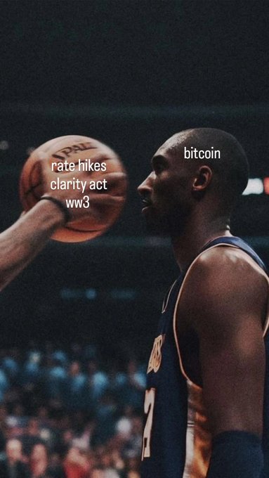 A meme using a basketball image of Kobe Bryant with a ball labeled 'rate hikes, clarity act, ww3' near his face and 'bitcoin' written near his head.