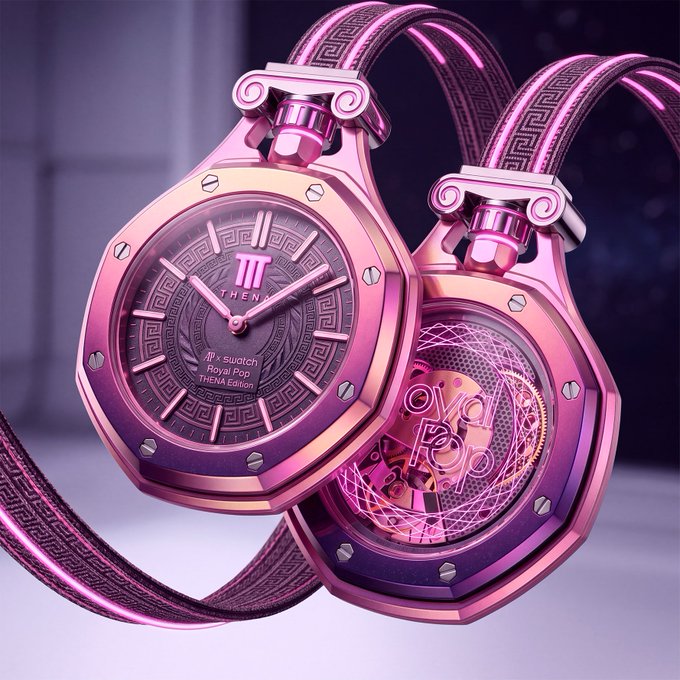 A close-up product shot of two pink/purple THEMA 'Royal Pop' watches from the Swatch x OVO Pop collaboration, featuring octagonal bezels, Greek key patterns, and the OVO owl logo visible on the caseback.