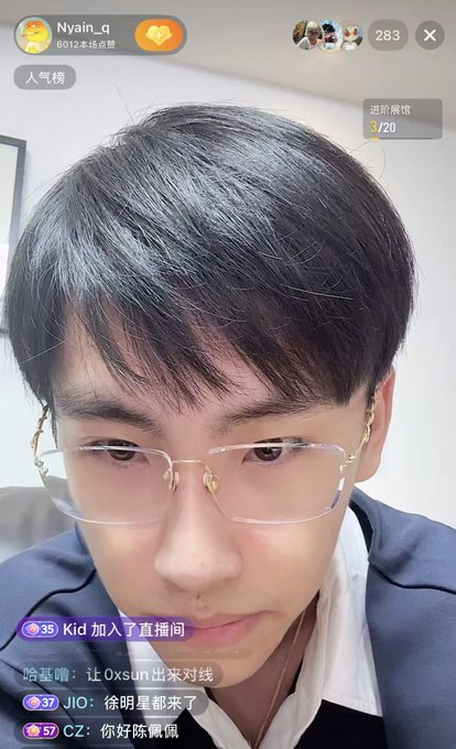 The image shows a close-up of a man with short black hair and glasses streaming a live video on Douyin (TikTok), with "Nyain_q" as the streamer name and 6012 hot points displayed. Chat comments at the bottom show users "Kid," "哈基嘣," "JIO," and "CZ" joining the livestream, with messages like "Oxsun出来对线" and "你好陈佩佩," matching the post's description of CZ joining the stream and interacting with the streamer @nyenchenn.