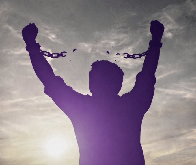 The image features a silhouette of a person with their arms raised high above their head against a cloudy sky backdrop, symbolizing strength or freedom. The caption reads "Gmonad frens. Been seeing a lot of good people and positive energy around Monad lately, so I figured it'S time to dive in properly. Looking forward to learning, building, and meeting more frens along the way."