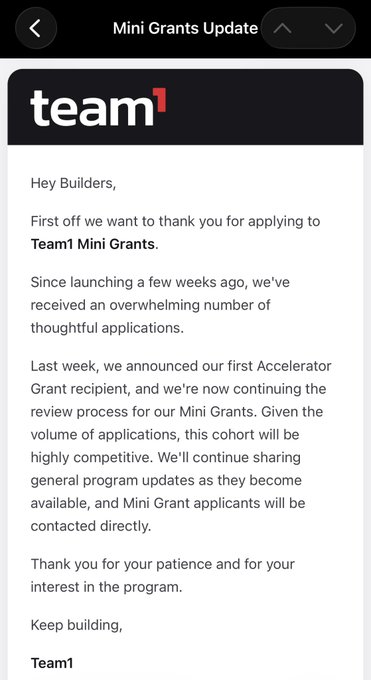 A screenshot of a notification titled "Mini Grants Update" from Team1, thanking applicants and noting that the cohort will be highly competitive as they continue the review process.