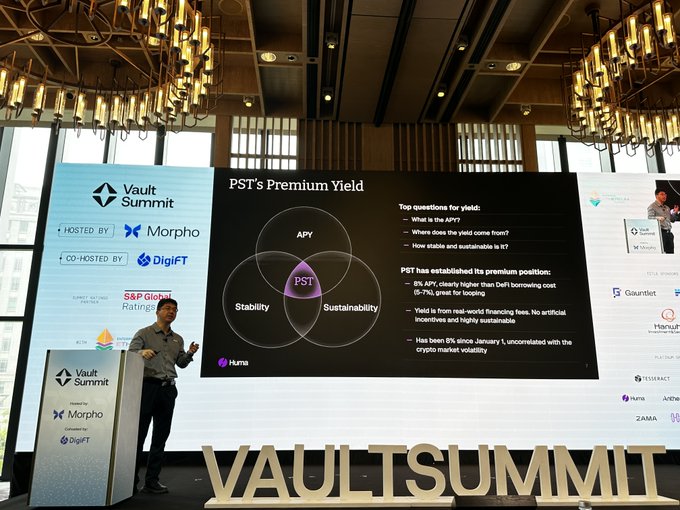 A presentation at the 'Vault Summit' discussing 'PST's Premium Yield,' highlighting the intersection of APY, Stability, and Sustainability on a large screen.