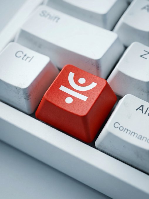 A close-up of a white keyboard featuring a striking red keycap with a white abstract logo, surrounded by keys labeled "Ctrl," "Shift," "Command," "Alt," and "Z." The vibrant red key symbolizes JustLend DAO's standout achievement in decentralized lending, standing out among the standard keys to represent their record-breaking growth in active wallets.