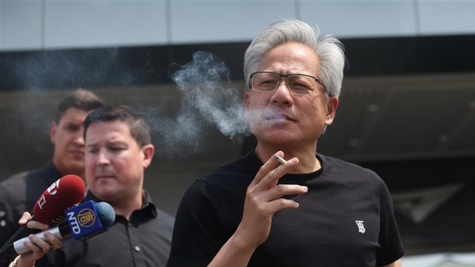An older man with graying hair smokes a cigarette, with microphones held by two other men visible, one bearing the "NTD" logo, hinting at a media event. The image relates to the post by illustrating the figure of "Jensen," possibly a prominent person at the center of attention during a significant event.