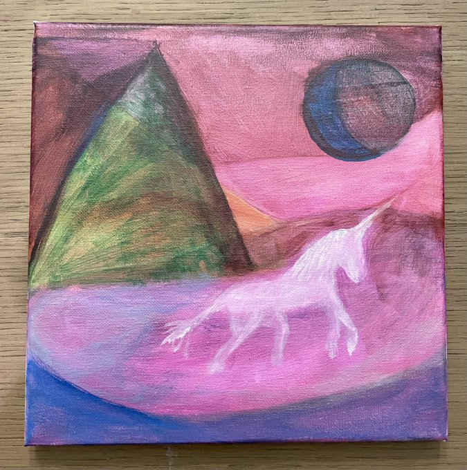 A small acrylic painting on canvas depicting a fantasy landscape with a green mountain, a dark blue moon in a pink sky, and a white unicorn with a horn walking across a pink and purple terrain.