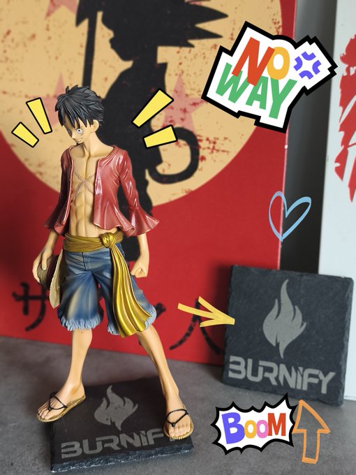 A One Piece Monkey D. Luffy figure stands on a "BURNIFY" branded base next to a matching BURNIFY logo block, with playful "NO WAY," "BOOM," and heart graphics overlaid. The image ties into the job-seeking post by suggesting the creator works at BURNIFY, a web3 company, and is showcasing their product photography skills as a portfolio piece while looking for new opportunities.