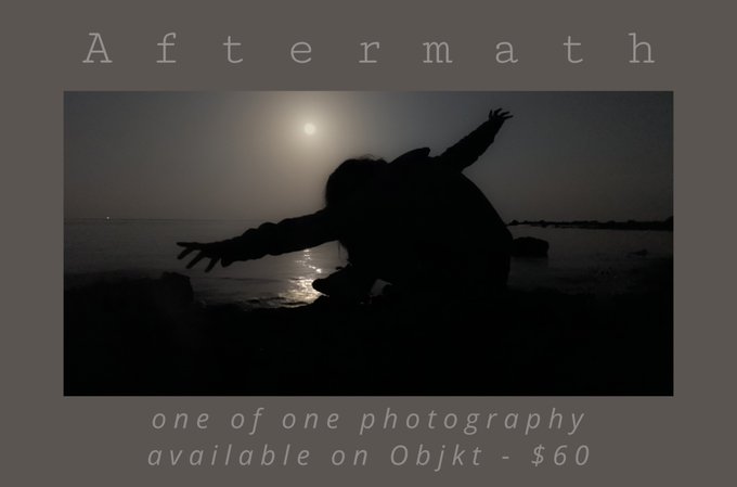 A promotional image for a photography piece titled 'Aftermath' showing a silhouette of a person reaching out by the water at night with the moon above; text reads 'one of one photography available on Objkt - $60.'