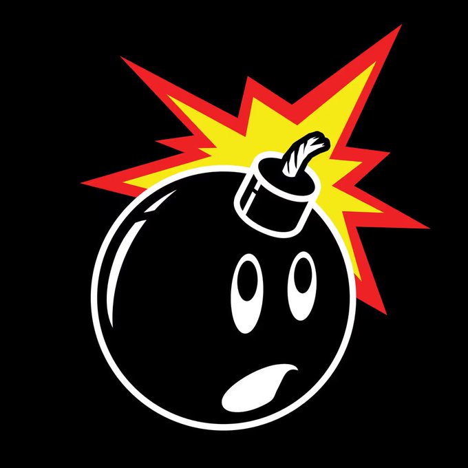 A cartoon bomb character with a face has a lit fuse, surrounded by a yellow and red explosion burst against a black background.