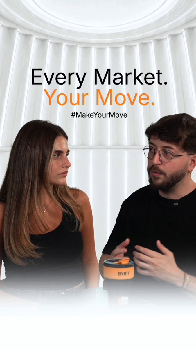 Two people appear in a studio setting beneath the text "Every Market. Your Move. #MakeYourMove," with a Bybit-branded container between them. The scene visually reinforces the post's theme by showcasing a Bybit TradFi conversation that explores market dynamics like gold rising while oil falls.