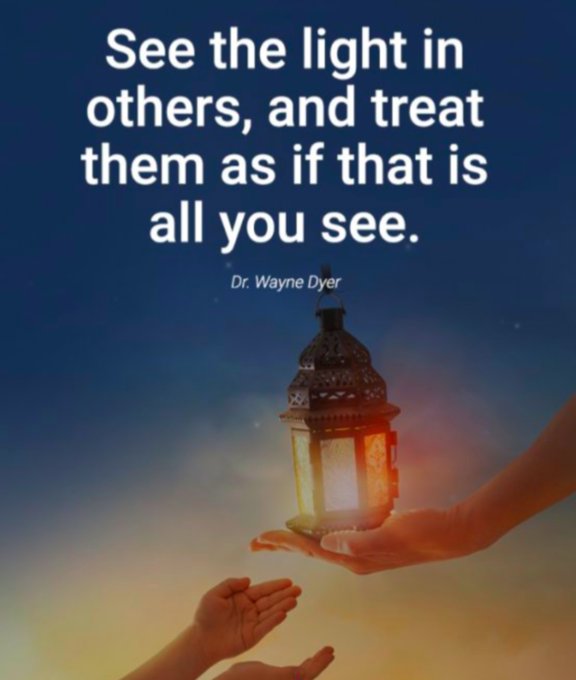 An inspirational quote graphic features a glowing lantern being passed between two hands against a twilight sky, reading 'See the light in others, and treat them as if that is all you see.' by Dr. Wayne Dyer.