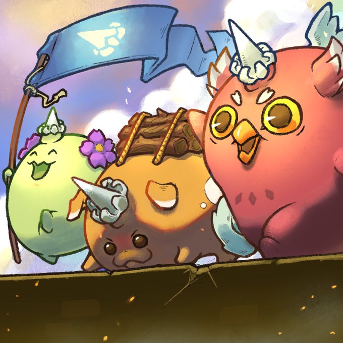 iced dragons with wings and horns, holding a blue banner, stand on a brick wall against a clear sky.