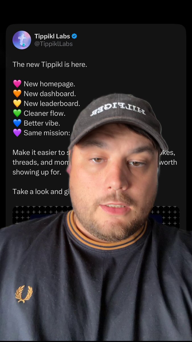 The image shows a man wearing a black shirt with a yellow design, who appears to be a user of the Tippikl Labs account. The post features a caption that reads "The new update is out! @TippiklLabs has had a facelift!" and includes emojis such as hearts and smiley faces. The man's face is visible in the image, and he seems to be looking at it with interest or curiosity.