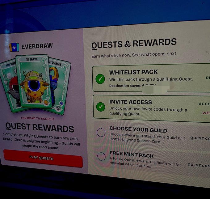 A photo of a monitor displays the Everdraw 'Quests & Rewards' page featuring NFT cards and options for Whitelist Pack, Invite Access, Choose Your Guild, and Free Mint Pack rewards.