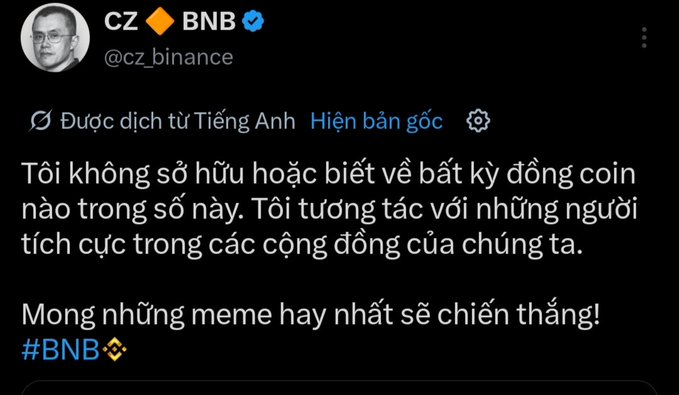 A tweet from CZ (cz_binance) translated into Vietnamese stating he does not own or know about any meme coins, hoping the best memes win, with #BNB tag.