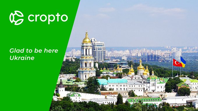 A Crypto.com promotional image shows the text 'crypto' and 'Glad to be here Ukraine' alongside a cityscape featuring golden-domed churches.