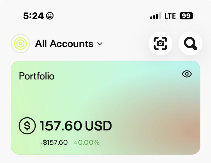 A mobile app screenshot shows a portfolio balance of $157.60 USD with a 0.00% change under the 'All Accounts' view at 5:24.