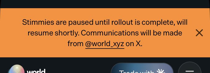 An orange notification banner reads 'Stimmies are paused until rollout is complete, will resume shortly. Communications will be made from @world_xyz on X.'