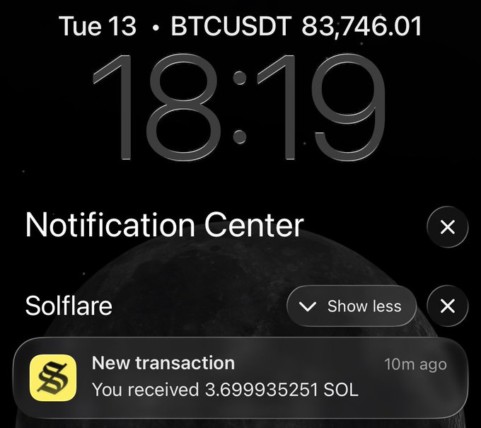 An iPhone lock screen showing the time 18:19 on Tuesday the 13th with BTCUSDT at 83,746.01, featuring a Solflare notification that reads 'New transaction - You received 3.699935251 SOL'.