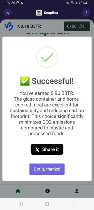 A SnapBox app screen showing a successful transaction earning 0.96 B3TR for choosing a glass container and home-cooked meal, noted as excellent for sustainability and reducing carbon footprint.