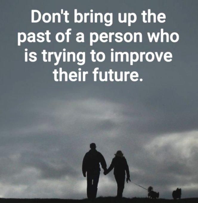 An inspirational meme showing the silhouettes of a couple holding hands and walking two dogs against a cloudy sky, with the text 'Don't bring up the past of a person who is trying to improve their future.'