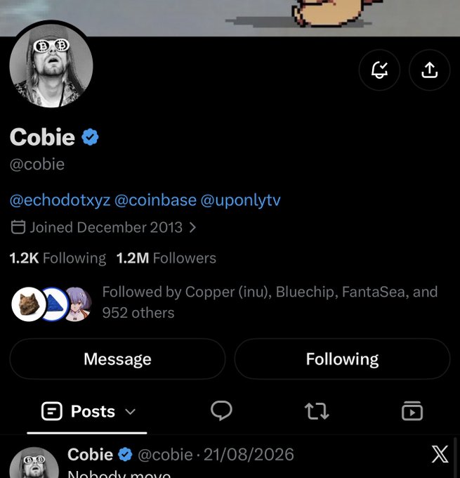 The image shows the Twitter/X profile of "Cobie" (@cobie), a verified account with 1.2M followers, joined in December 2013, featuring a recent post dated 21/08/2026 that begins "Nobody move." The profile connects to the accompanying text about Cobie and the CBO of Coinbase following @o1bluechip, highlighting Base's record trading volume and Bluechip's dominance as 16% of $NVDA's onchain activity.