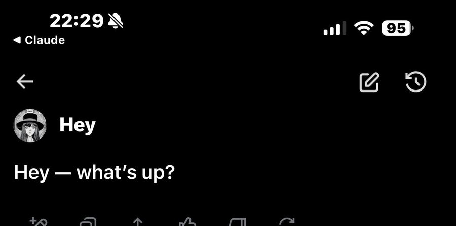 A phone screenshot showing a chat with 'Claude' at 22:29 displaying the message 'Hey' and reply 'Hey — what's up?' with 95% battery.