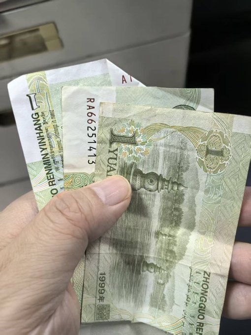 A hand clutches several crumpled Chinese 1 Yuan banknotes (serial R466251413, dated 1999), visually echoing the post's themes of financial struggle and cyclical market emotions—people holding on to diminishing cash while navigating the highs and lows of investment loss and hope.