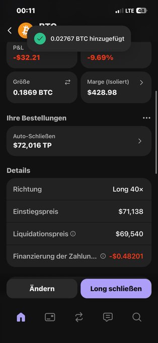The image shows an electronic device, likely a cell phone or tablet screen displaying the Bitcoin cryptocurrency trading app interface. The application's summary of the Bitcoin market performance, including details about current exchange rates, transactions, and overall value fluctuations can be seen on the screen. The screen also provides information in both German and English to cater to various audiences. The post includes text that reads: "Hab ein Monster gebaut aus $strc $tesla stocks". This could possibly suggest Bitcoin mining equipment being used as an alternative means of trading Bitcoin for other assets, such as Tesla stocks, given the reference to Bitcoins being mined on Tesla's power grid.