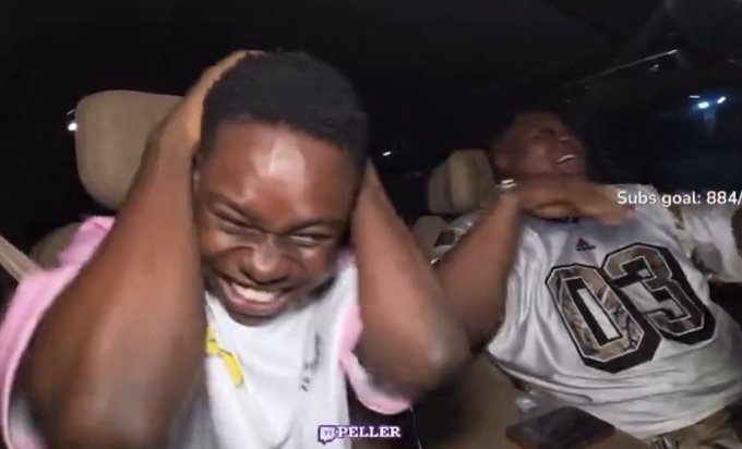 The post says: "Once I see say na my mutual dey share WL I don know say the NFT go gba" which means "Once I see that my mutual friends are sharing WL (whitelist), I know the NFT project will succeed." The image shows a man in a white t-shirt reacting with exaggerated excitement and joy, covering his ears with both hands, while another person beside him wearing an NFL jersey with "03" on it cheers. The text "Subs goal: 884" and "JP PELLER" watermark are visible, suggesting this is a celebratory reaction to a successful NFT whitelist or mint outcome.

A concise caption: "A content creator reacts with unbridled excitement to NFT success, with 'JP PELLER' watermark and 'Subs goal: 884' visible on screen."