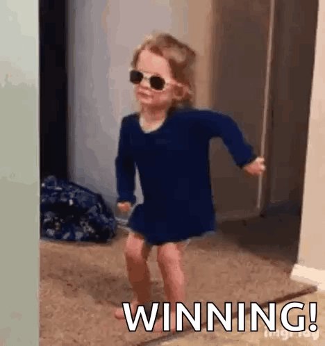The image features a young girl wearing sunglasses, standing on her tiptoes with arms outstretched, giving off an impression that she's dancing or celebrating. The caption below the photo reads "Winning!", which seems to be related to the content of the image and possibly a social media post about investing in cryptocurrency.