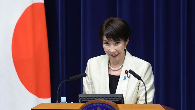 A Japanese official speaks at a podium, likely announcing SBI and Tobu's initiative to put Japan's ¥30 trillion prepaid market on XRPL, which the post suggests could boost XRP adoption.