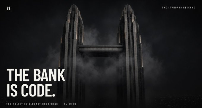 A dark, atmospheric image of twin skyscrapers shrouded in fog with the text 'THE BANK IS CODE.' and 'THE POLICY IS ALREADY BREATHING - 14:00 28' from 'THE STANDARD RESERVE'.