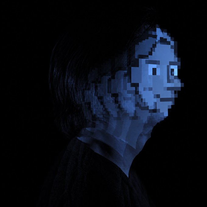 A dark, surreal portrait of a person in profile with their face partially replaced by blue pixelated blocks fading into darkness.