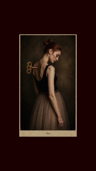 A woman with red hair in a bun wears a black top and a flowing cream-colored skirt, with a large vintage key protruding from her back, set against a dark background with the word 'time' written below.