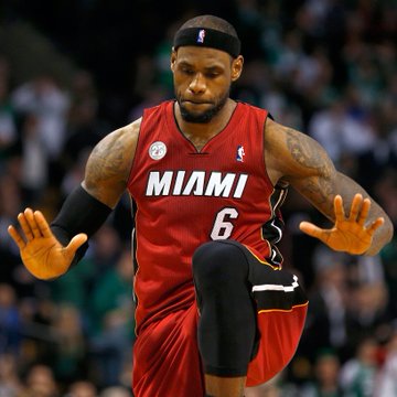 LeBron James, wearing a red Miami Heat jersey with the number 6, appears to celebrate on the court as Polymarket odds show Miami climbing to 30% in the LeBron James sweepstakes, narrowing the gap behind Cleveland's 44%.